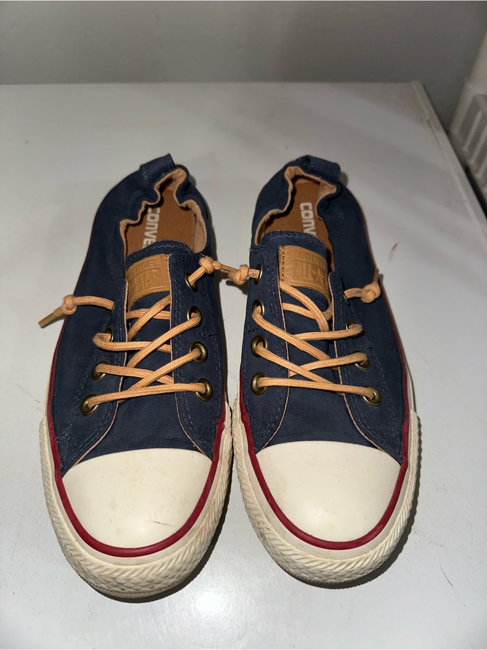 Converse women’s Navy Canvas Low-Top Sneakers with Tan Laces